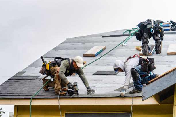 Professional Storm Damage Roof Repair technician working in Durhamville, NY